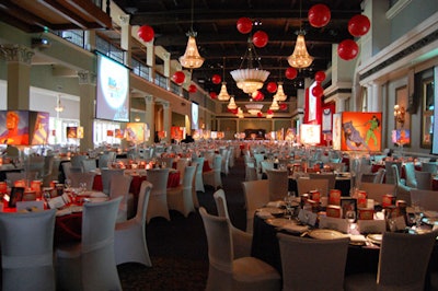Solutions With Impact dressed the main dining room in red and cream.