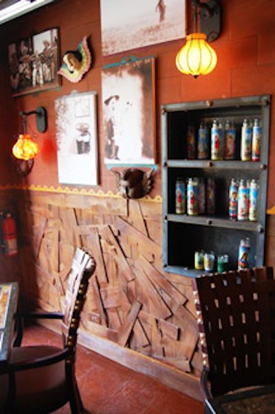 Woven leather chairs surround low-slung tables, and walls are covered in Mexican art.