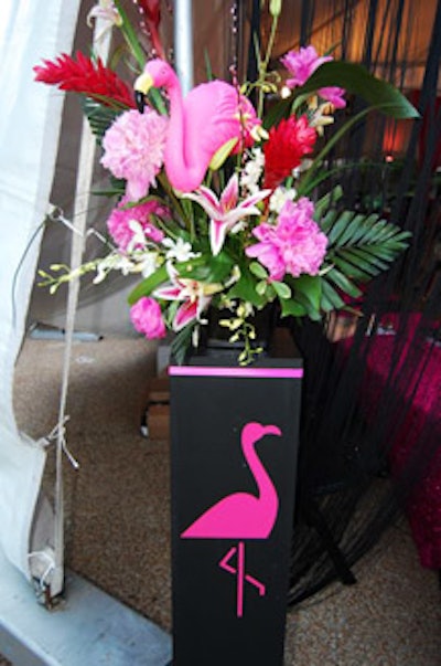 Paul Anthony's floral arrangements played off the evening's theme by incorporating plastic flamingos and pink and black hues.