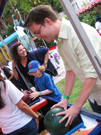 Adults played alongside children at the many carnival game booths.