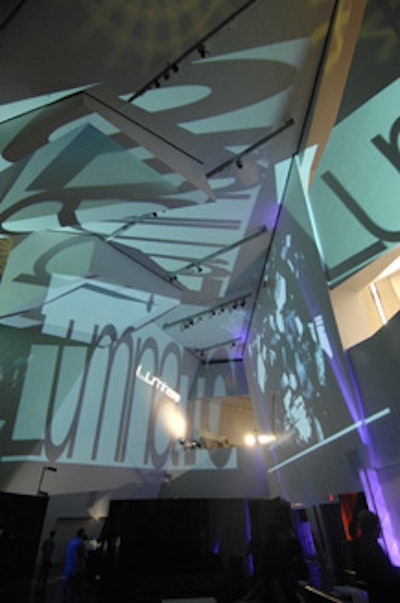 The angled ceiling of the Michael Lee-Chin Crystal served as a projection surface for Luminato performances throughout the evening.