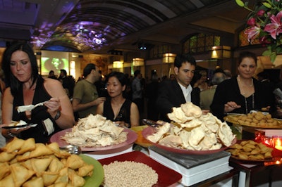 Guests sampled a selection of vegetarian pakoras and samosas at a food station at the Currelly Gallery entrance to the museum's southeast atrium.