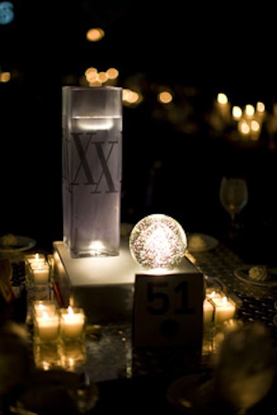 Another tabletop centerpiece featured a crystal obelisk adorned with Diffa/Chicago's 20th anniversary gala logo.