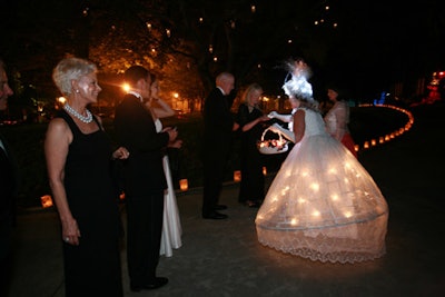 Performers in lit-up costumes greeted guests at the Washington National Opera Ball.