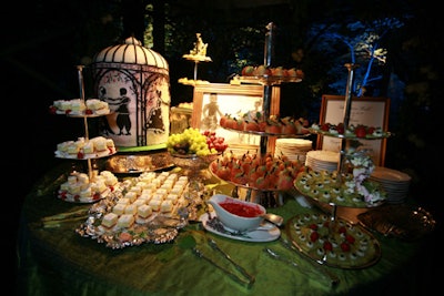 Occasions Caterers offered a selection of cakes in the tent, including a rolled fondant cake decorated with silhouettes similar to those in the residence's front windows.