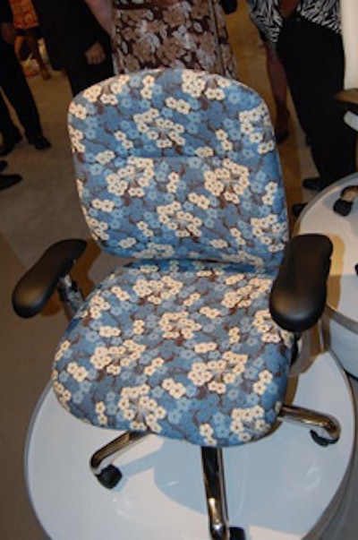A cherry-blossom-patterned fabric served as the inspiration for the event's blue, white, and chocolate-brown color scheme.