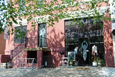 The new location for Tranquil Space is in a three-story brick building, with an entrance through the boutique.