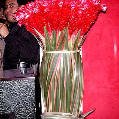 L'Olivier's large arrangement of ginger used long tropical leaves to create the vase.