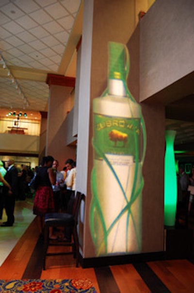 A projection of the Zubrówka bottle lit one of the bar's walls.