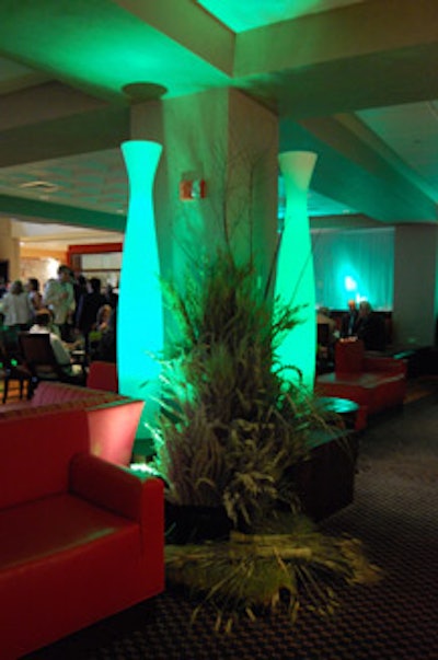 The event incorporated large arrangements of wild grass alongside the venue's permanent standing lights, which can take on 16 different colors.