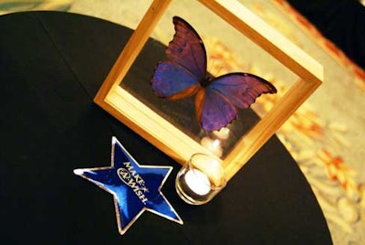 Throughout the enchanted forest, butterflies were found everywhere, including authentic specimens from around the globe placed on cocktail tables.