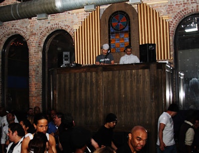 The 15-foot DJ booth is modeled after a pulpit.