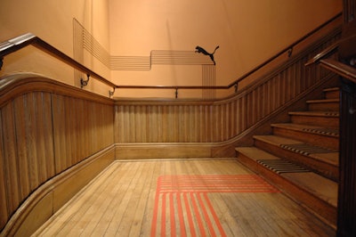 Striped decals marked floors throughout the hallway and created a runway on the fourth floor where Puma staged a fashion show at 2 a.m.
