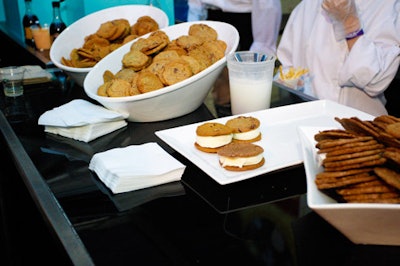 Servers offered vanilla ice cream sandwiches, made with a variety of cookies, to guests in the party tent.