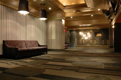 Tactile details like the beaded curtain hanging against one of the upstairs walls are designed to evoke the 1930s style of the ballroom.