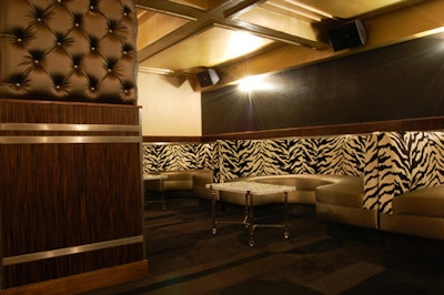 The cocktail room—a section off the upper-level balcony—can be sectioned off as a separate event space. It features its own bar, entrance, and stage.