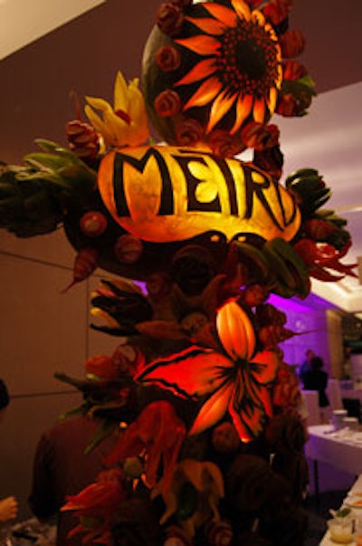 Near the entryway, Hugh McMahon carved a sunflower and other floral shapes into an elaborate piece made with vegetables.