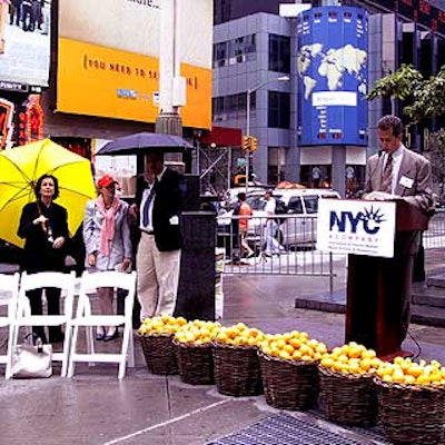 Left to right: Citymeals-on-Wheels executive director Marcia Stein, NYC & Co. president Cristyne Lategano-Nicholas and Tim Zagat took cover from the rain while Danny Meyer made a short speech about Restaurant Day.