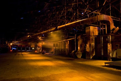 Toronto set designer Glenn Davidson lit the factory building for the event, using cool and warm colours on opposite sides of the venue to play up the evening's water and fire theme.