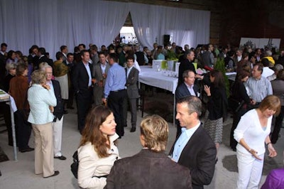 Guests gathered for a cocktail reception prior to dining on a meal prepared by local chef Jamie Kennedy.