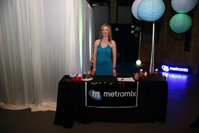 Metromix created a prom-themed installation that allowed guests to have their photo taken in front of a star-covered backdrop.
