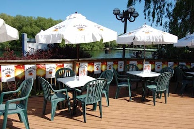 Patio umbrellas bearing the Malibu Rum logo provided shade at tables set up around the venue.