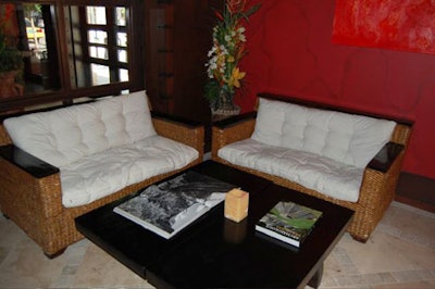 The lower-level lounge is filled with furniture imported from Bali.