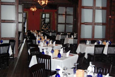 Upstairs, five side-by-side dining rooms can be combined to seat 175 guests.