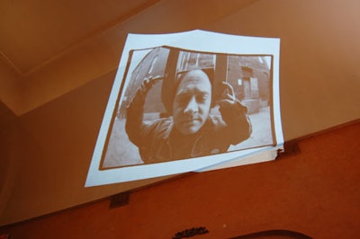 Projections of old photos and posters from past Fringe Festivals decorated the venue's ceiling.