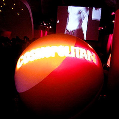 Intermedia Production Group used a gobo to shine the Cosmopolitan logo on a giant billiards ball at the entrance to Pressure, the space under a pressurized bubble on the rooftop of Bowlmor Lanes.