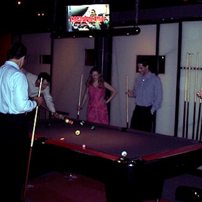 Pressure's numerous television screens showed a video with the Cosmopolitan logo and clips with iconic, strutting male actors.