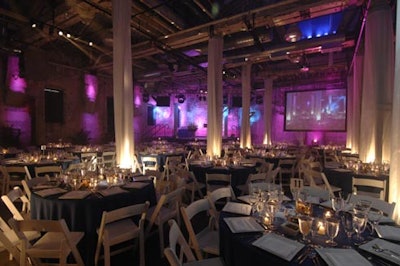 Dragos Productions hung white fabric from the rafters to create columns between the dining tables at the Fermenting Cellar.