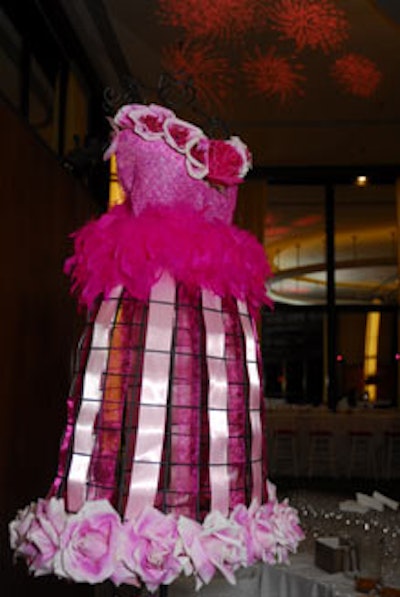 Nonprofit Once Upon a Prom, which donates prom dresses to Washington-area girls, held a benefit in April that took its design cues from the organization's mission. In addition to an abundance of hot pink accents (flowers, chair cushions, and gobos), Janet Flowers created frilly sculptures of prom gowns on wire dress forms.