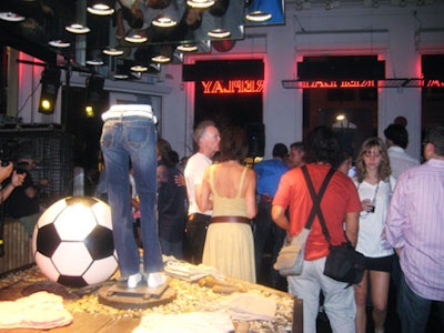 Oversize soccer balls added a sporty touch to clothing displays.