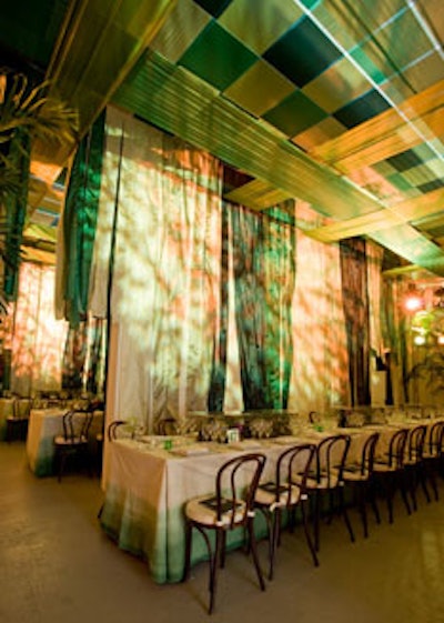 Fabric in shades of green helped create intimate dining spaces in the emerald dinner room.