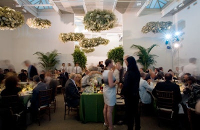 Some of the evening's 700 guests dined under floral clouds in the sky room.