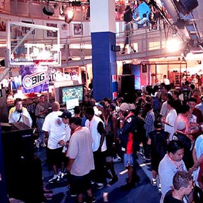 The mini basketball court on the bottom floor of the NBA Store hosted the event, which had several audio speakers from Studio Instrument Rentals blaring hip-hop music while guests played Playstation games.