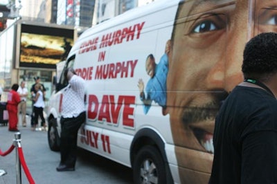 Parked behind the head in Times Square, a van covered with the Meet Dave poster acted as an additional marketing signage.