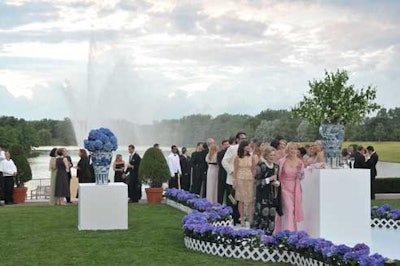 Guests congregated for the Summer Dinner Dance cocktail reception on the Chicago Botanic Garden's esplanade.
