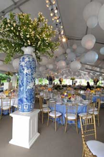 Six-foot-tall blue-and-white urns filled with blossoms adorned the dinner tent.