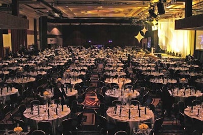 The dinner and its 1,600 guests took over every inch of the grand ballroom, with the stage at the center.