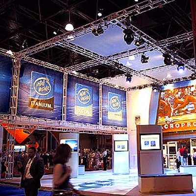 Steel pipe framework displays (like this one by Intel) were another trend at the show, giving booths a strong, high-tech look.