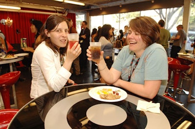 Guests snacked at cocktail tables decorated with the Target logo at the Target Red Room pop-up during the festival.