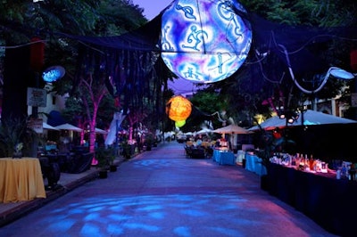 Large colorful spheres decorated with magical creatures' glyphs from Hellboy II hung over the festival's closing-night street party.