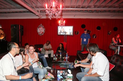 Plastic chandeliers with red light bulbs gave the Target Red Room a punch of style.