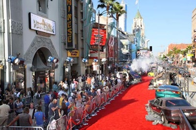 Crowds lining Hollywood Boulevard looked to giant screens broadcasting arrivals, as well as Hancock premieres that had already taken place in other cities.