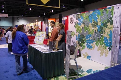 The U.S. Green Building Council decked its display with a retro-looking leafy backdrop.