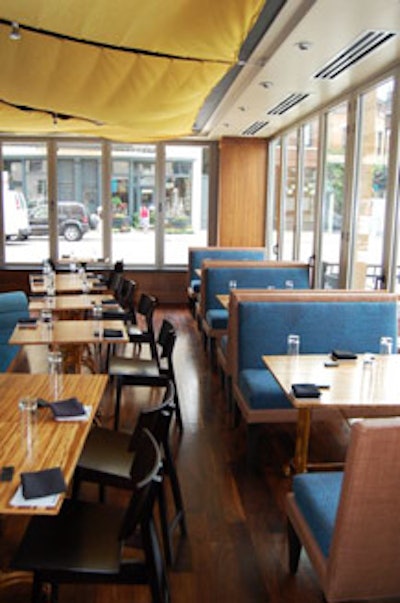 The restaurant's floor-to-ceiling windows look out over Wells and Clark Streets and Lincoln Avenue.