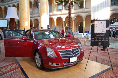 Sponsor Cadillac parked a red CTS at the front of the event.