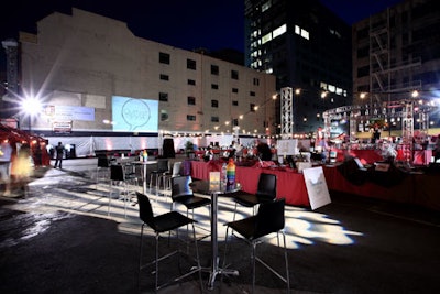 Outfest's and participating sponsors' logos shined on a neighboring building's wall.